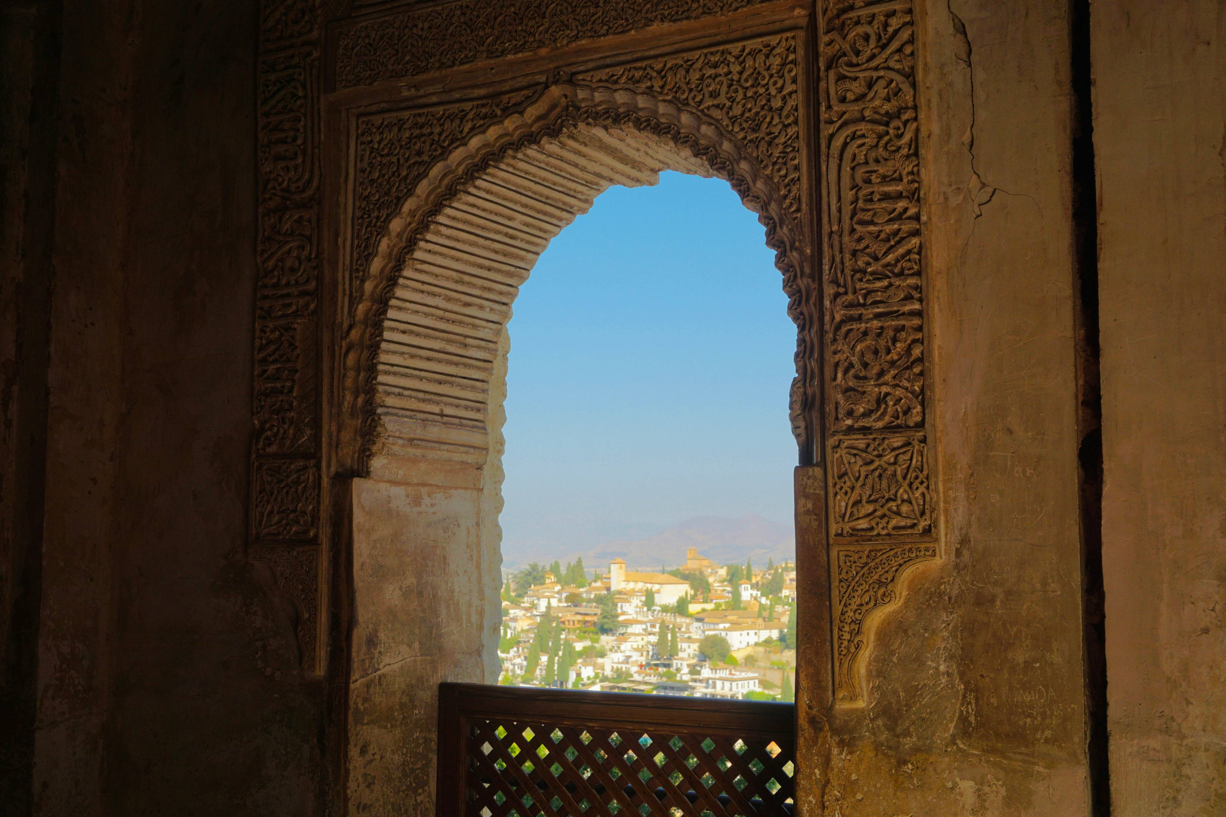 a window with a view of a city