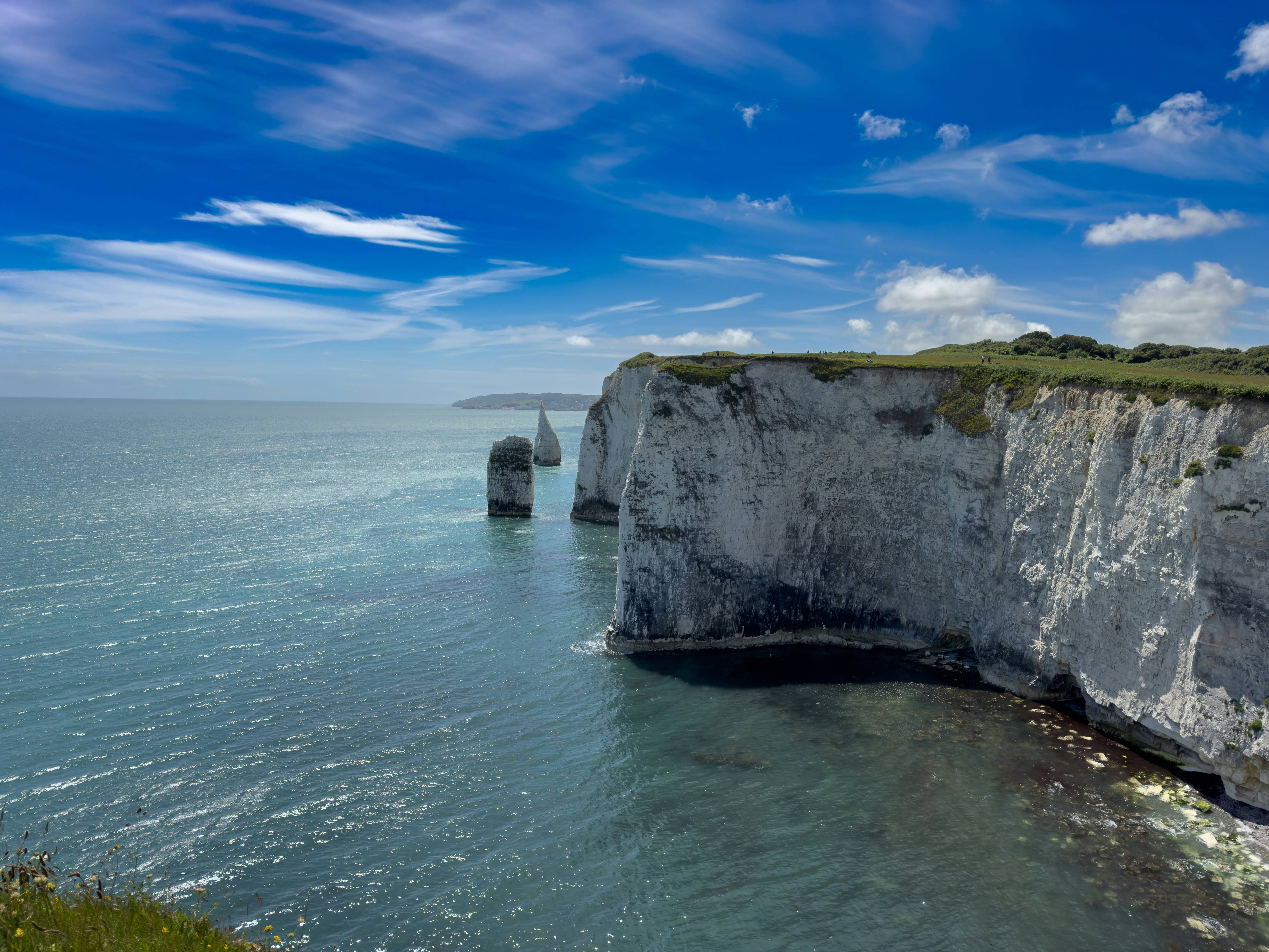 A view of the cliffs and the ocean from a cliff