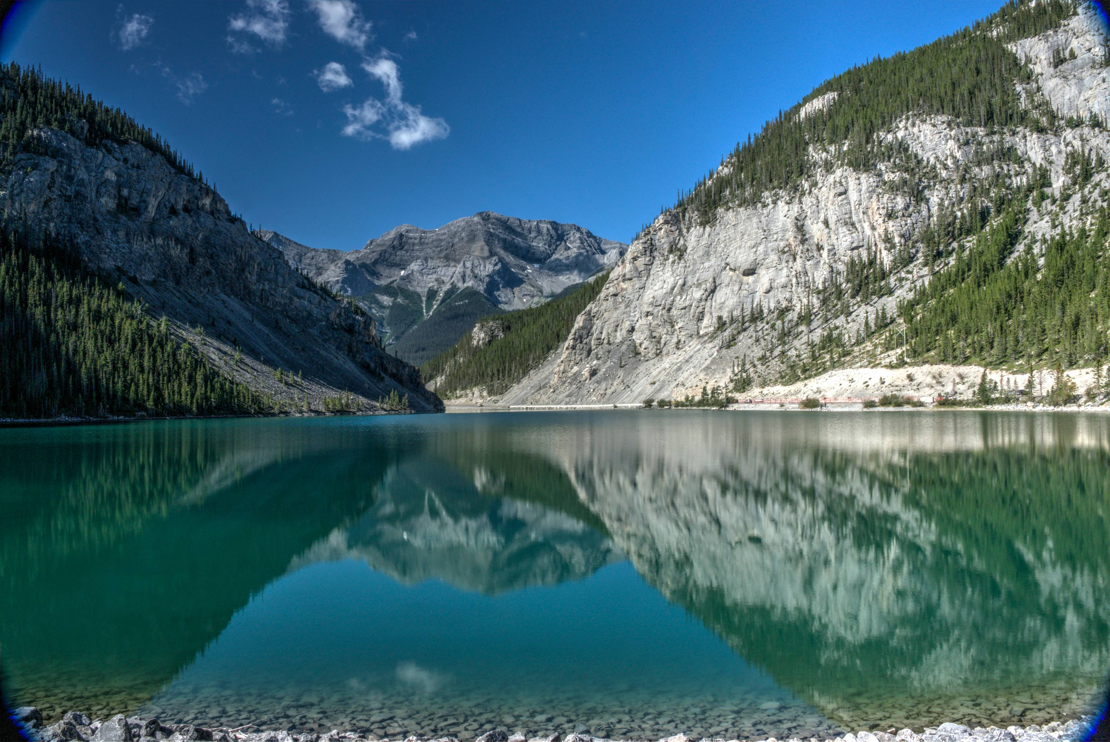 a lake surrounded by mountains